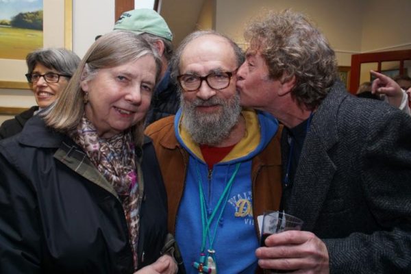 Gallery artist SAM BARBER, center, gets some love from his wife, JANIE, and artist ALFIE GLOVER photos by Kara Ryan